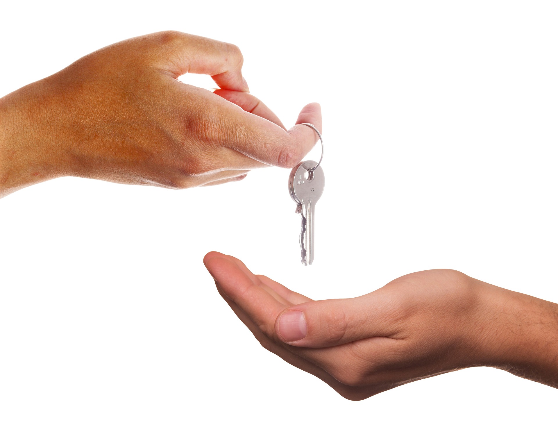 Landlord shaking hands with a tenant before a rental property inspection